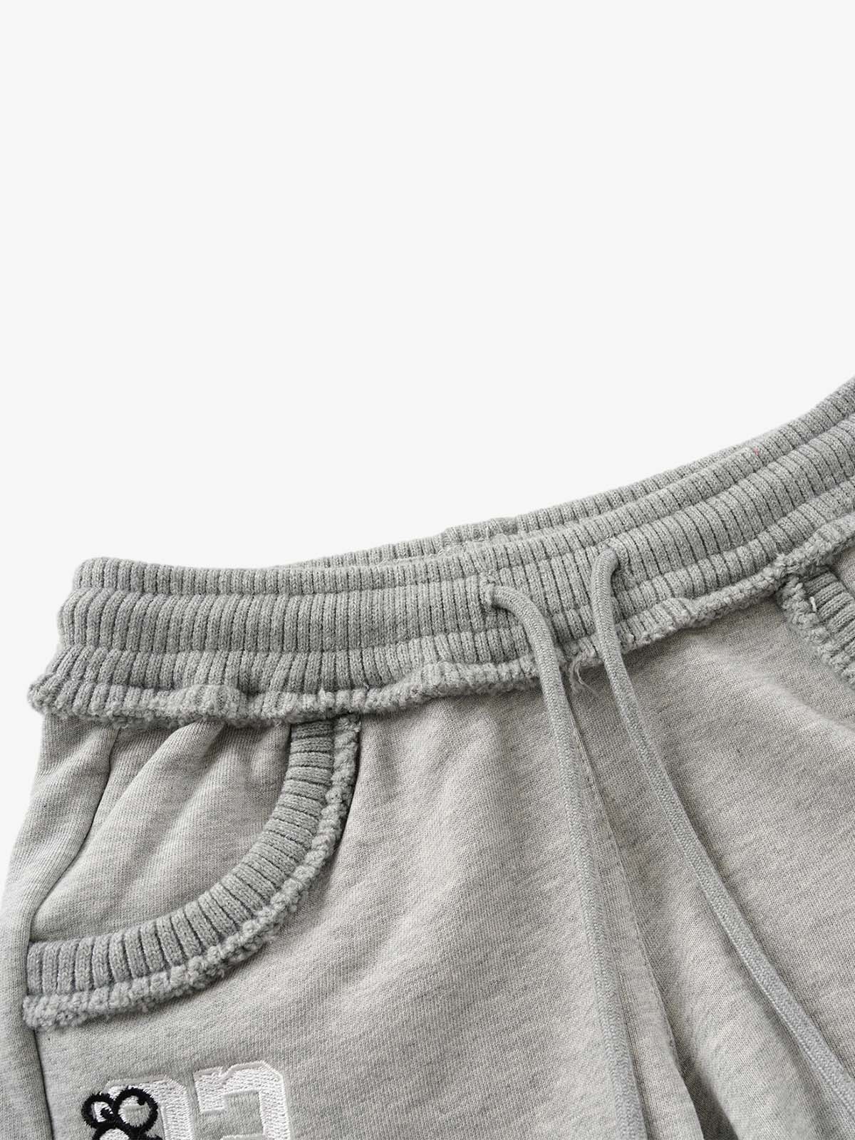 Bestickte Mini-Shorts mit offenem Saum