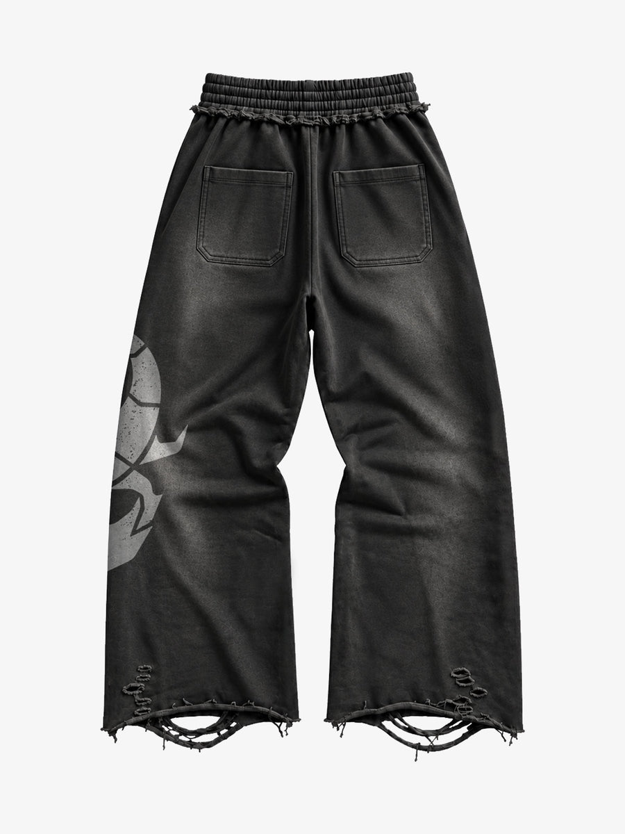 Sweatpants mit weitem Bein aus gewaschenem Frottee mit Grafik-Print im Distressed-Look