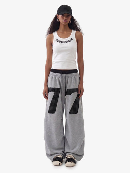 Pantalones deportivos fruncidos de doble talle