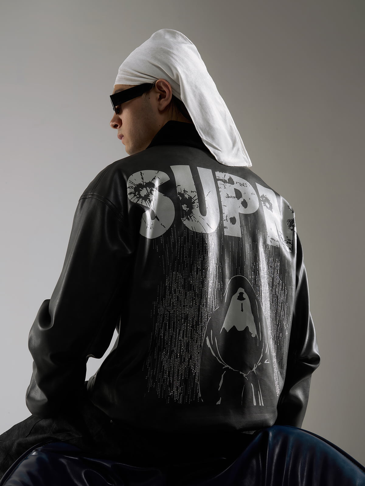 SUPM Leather Jacket with a Fur Collar and Bullet Hole Monogram Print and Rhinestone Pattern 