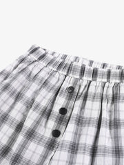 チェック柄のワイドレッグパンツ（ボタン付き）
