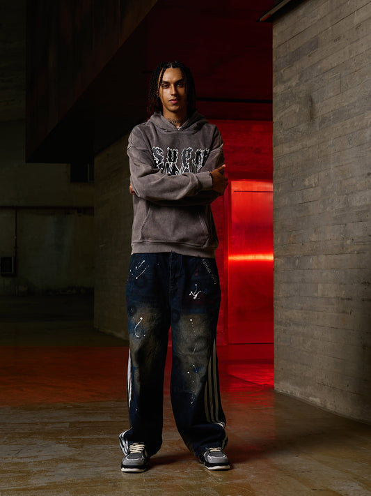 Distressed Graphic Hoodie for Urban Streetwear Enthusiasts 