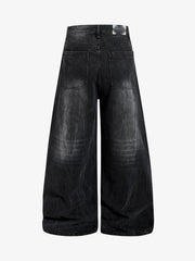 Schwarze, gewaschene, weite, knöchellange Jeans