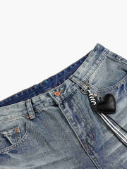 Jeans délavés et usés