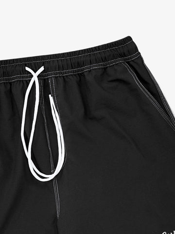Minimalistische Shorts mit Kontrastnähten und Kordelzug