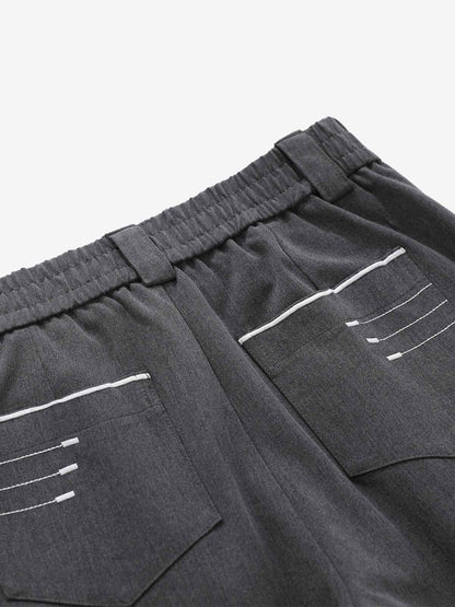 Minimalistisch drapierte, maßgeschneiderte Hose