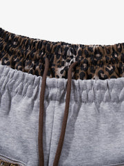 Completo due pezzi con stampa leopardata a righe