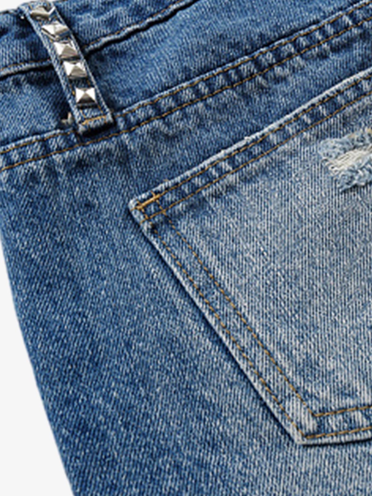 Mini shorts a vita bassa con borchie metalliche effetto invecchiato di Thesupermade