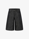 Short en jean patchwork à clous