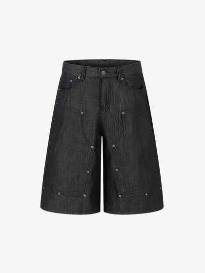 Pantalones cortos vaqueros con tachuelas y patchwork