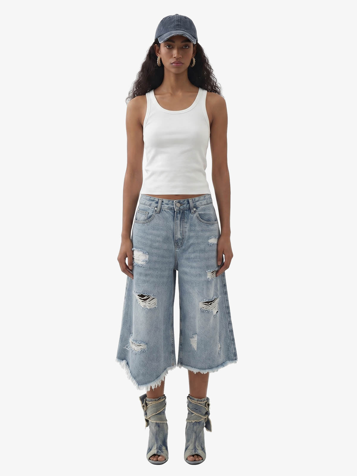 Short en jean délavé et usé