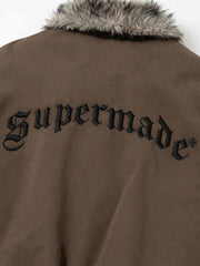 Chaqueta bomber extragrande desgastada con cuello de piel sintética bordado