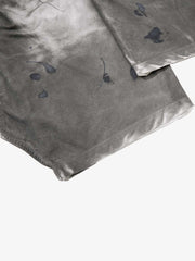 Pantalones anchos desgastados
