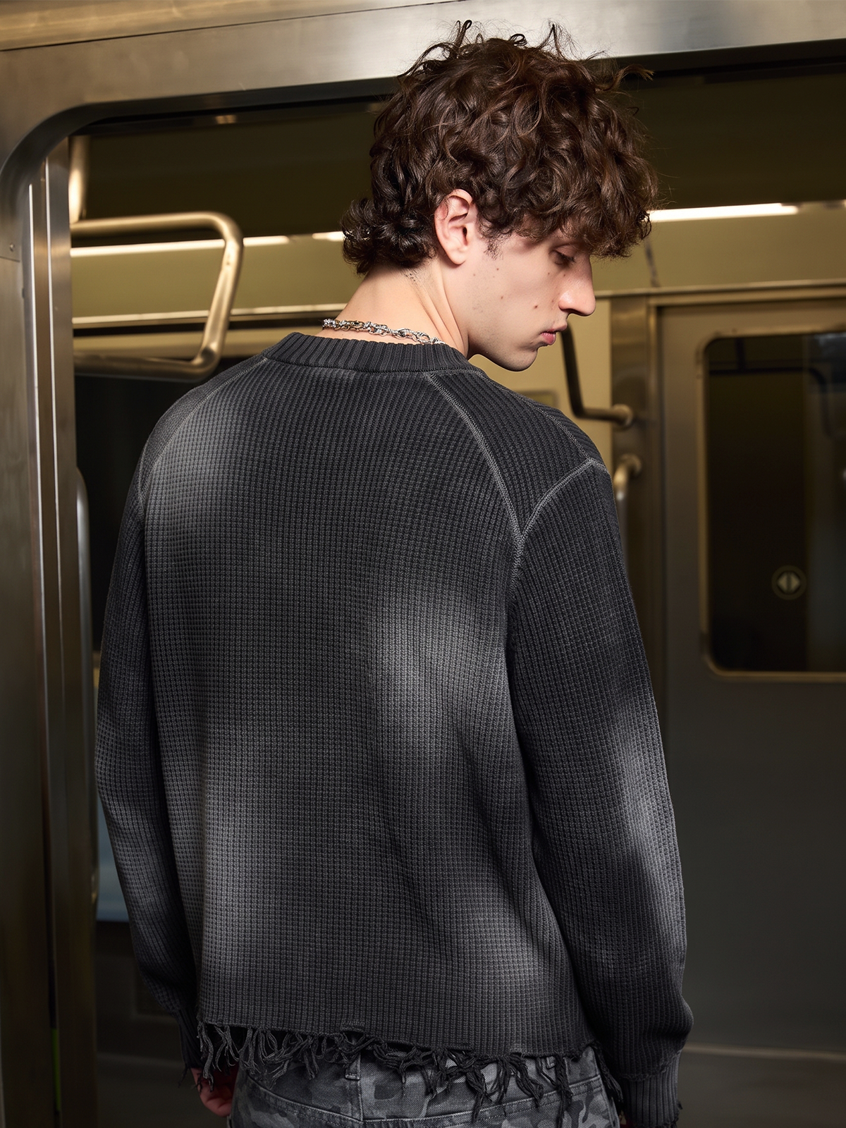 Dark Graphic Distressed Knit Sweater