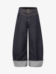 Jeans holgados con dobladillo y pedrería de Thesupermade Raw Denim