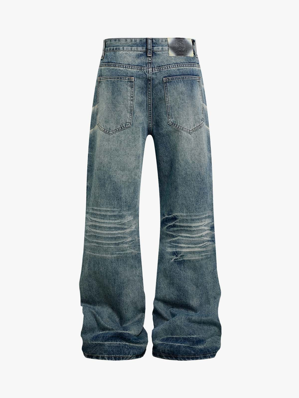 Jeans délavés et usés