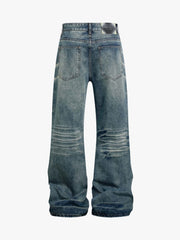Jeans délavés et usés