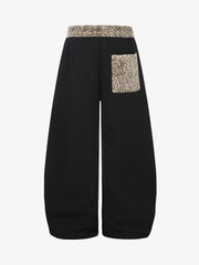 Pantaloni della tuta larghi con applicazioni a stella leopardata