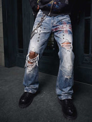 Pantalones vaqueros de bota con bandera y tachuelas