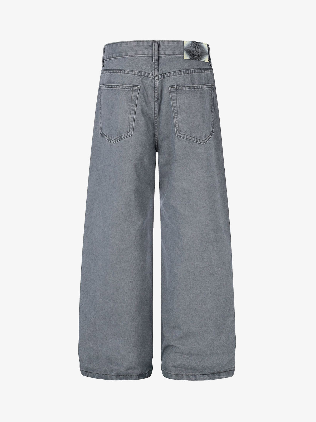 Jeans à rivets découpés