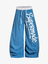Leichte blaue Windbreakerhose – Packbar, wasserabweisend, funktionale Passform