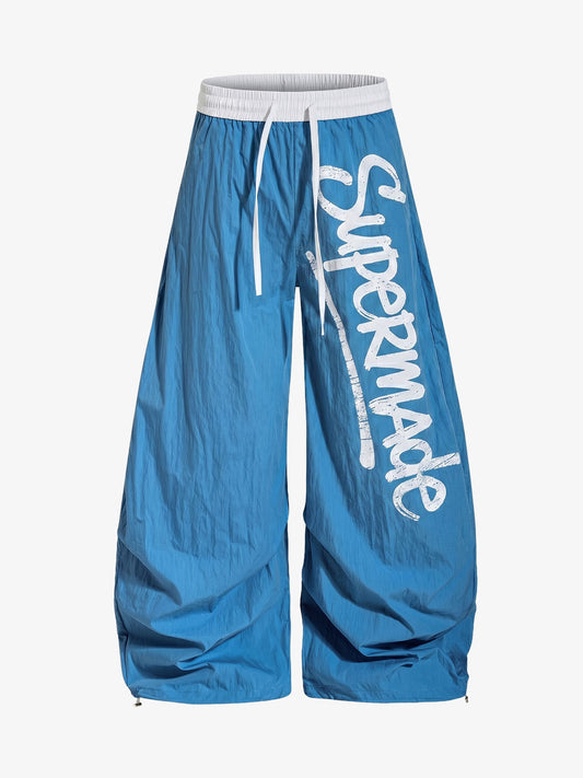 Leichte blaue Windbreakerhose – Packbar, wasserabweisend, funktionale Passform