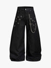 Jeans holgados vintage con ojales y cadena