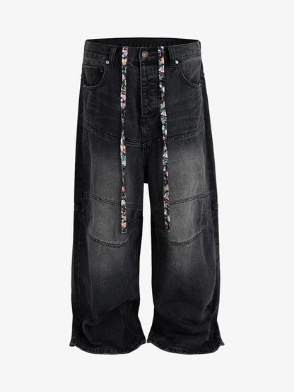 Wide-Leg Denim Trousers with Unique Floral Drawstring and Bold Street Style Design 