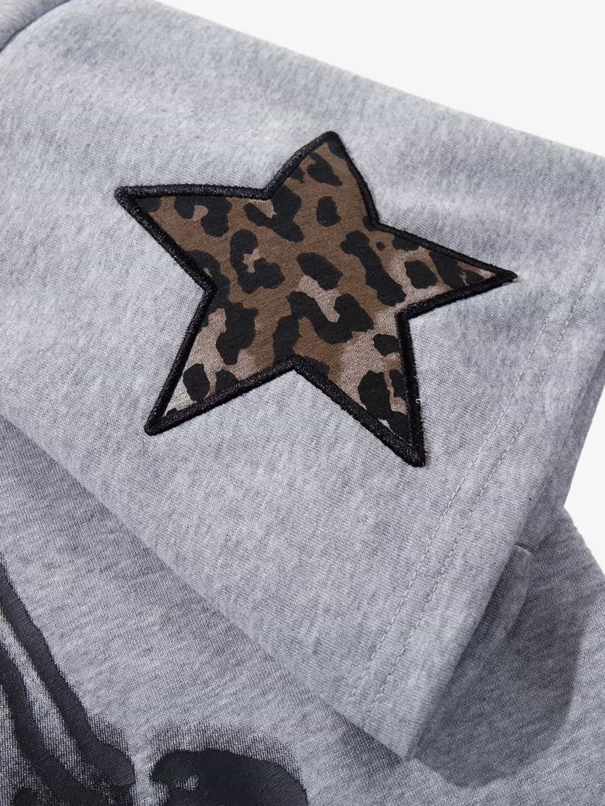 Completo due pezzi con stampa leopardata a righe