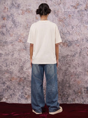 T-shirt con grafica astratta dipinta a mano