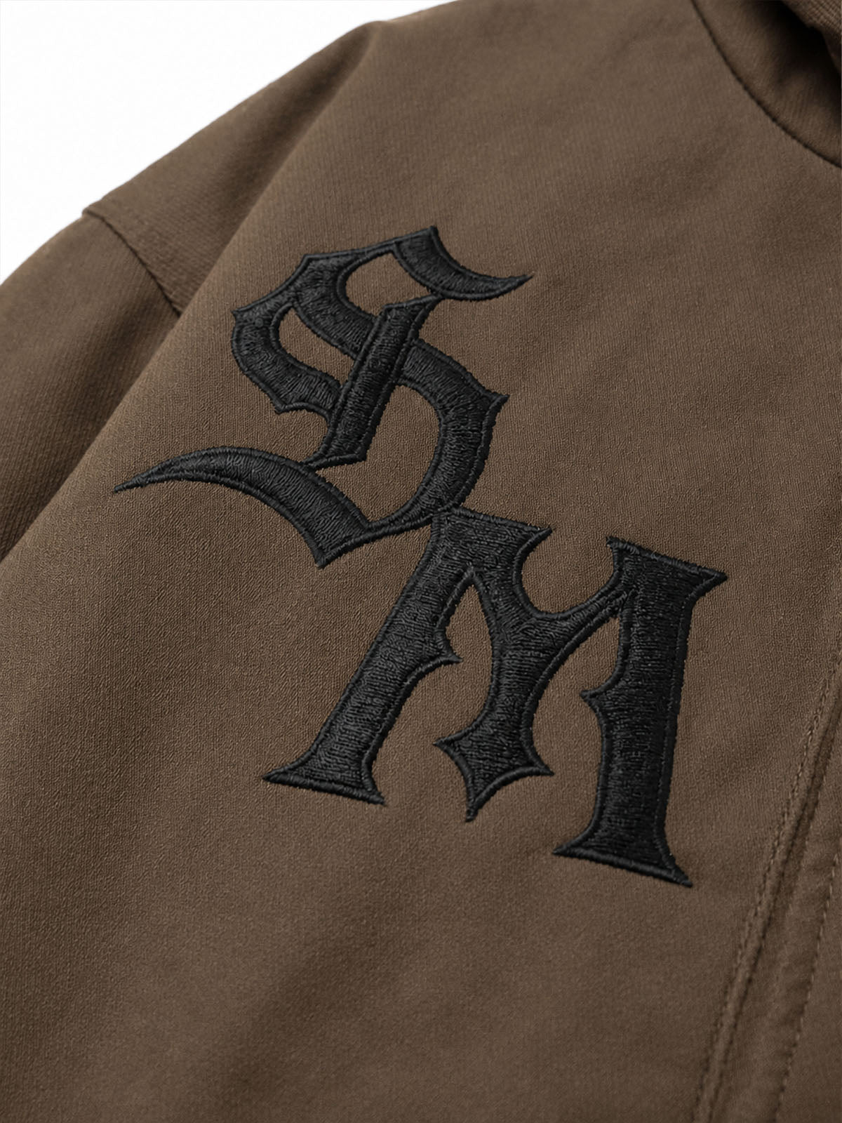 Chaqueta bomber extragrande desgastada con cuello de piel sintética bordado