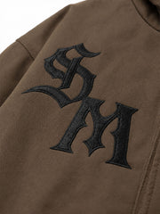 Chaqueta bomber extragrande desgastada con cuello de piel sintética bordado
