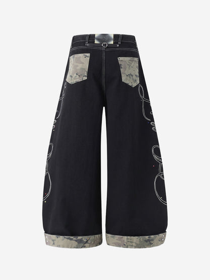 Jeans mit Camouflage-Patchwork, Strassstickerei und geradem Bein