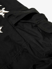 Pantalon brodé étoiles et léopard