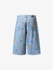 Jeansshorts mit Farbspritzermuster und weitem Bein