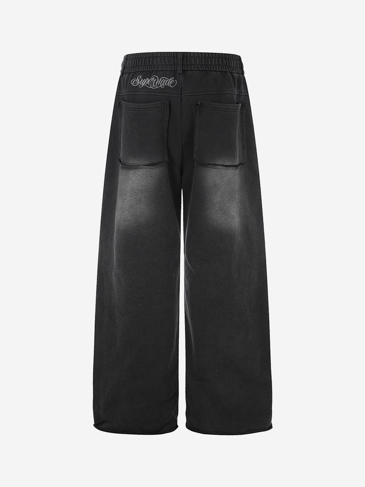 Gewaschene, bestickte Hose mit Ösen und Nieten