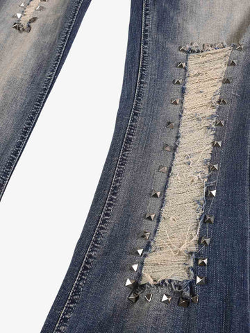 Ripped Studded Low Rise Bootcut Jeans