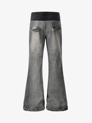 Gerippte Bootcut-Jeans mit umgeschlagenem Bund