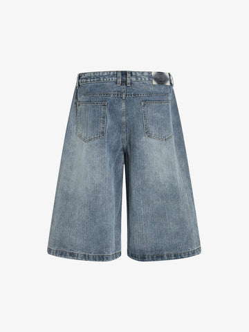 Short en jean délavé à fleurs