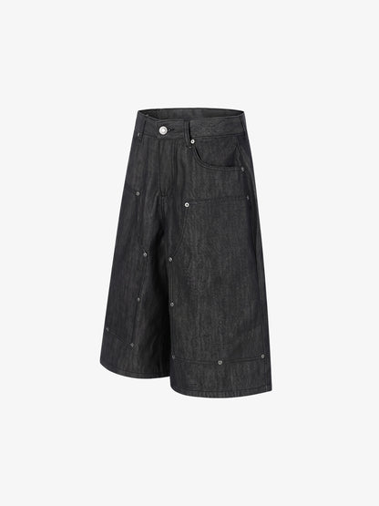 Pantalones cortos vaqueros con tachuelas y patchwork