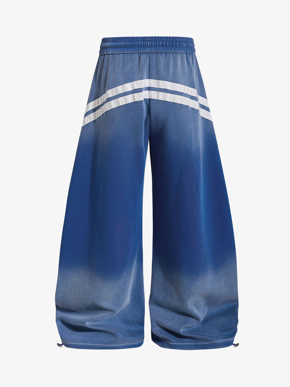 Baggy-Sweatpants mit Used-Look-Muster und geschwungenen Streifen