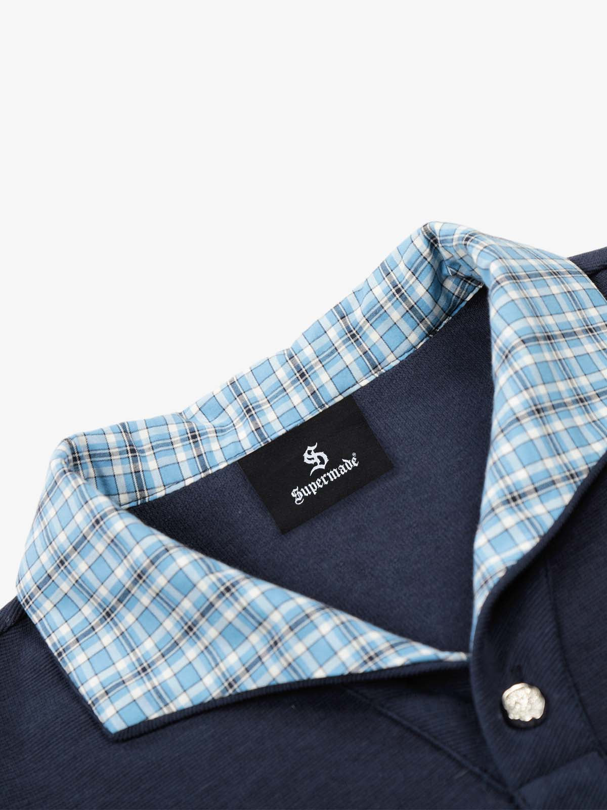 Poloshirt aus Piqué-Baumwolle mit kariertem Kontrastkragen und -bündchen