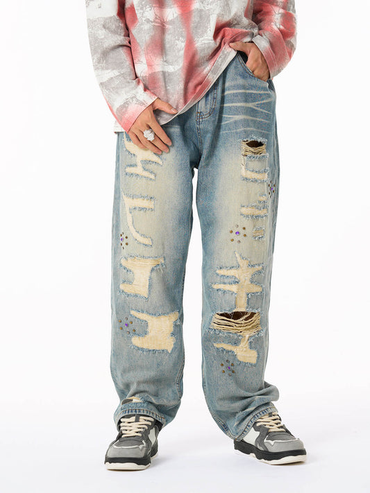 Distressed Denim Jeans with Embellished Patches and Bold Lettering - Perfect for Trendy Streetwear 