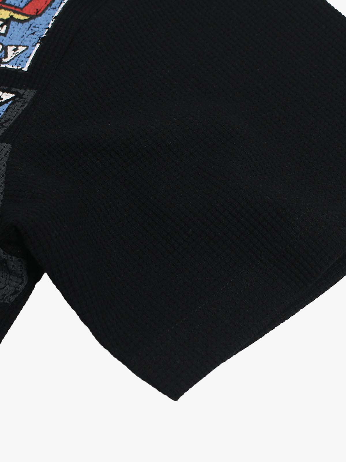 Cotton Oversized Graphic T-Shirt with Newspaper Print and Metal Eyelets 