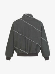 Dekonstruierte Patchwork-Jacke mit ausgefransten Kanten und ausgewaschenem Design