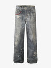 Distressed heavy-duty painted straight-leg jeans, adorned with red graffiti prints and paint-splatter wash effects 