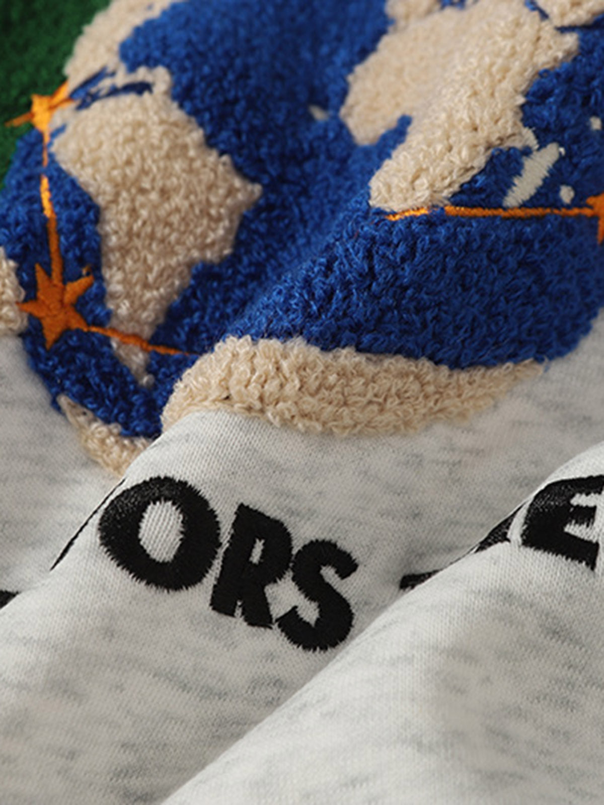Unisex Hoodie with Embroidered Earth and Star Design - Trendy and Bold Statement Piece 