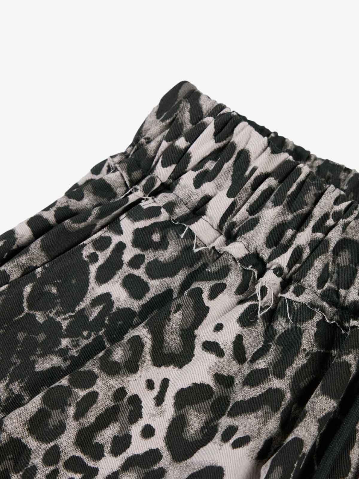 Stylish Leopard Print Wide-Leg Pants with Unique Graphic Design 