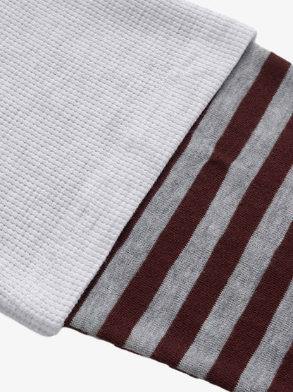 Stylish Black Polo Shirt with Striped Sleeves and Graphic Design 