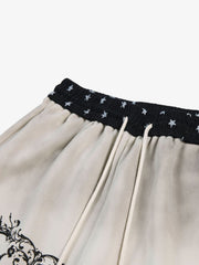 Ornate Graphic Wide-Leg Sweatpants
